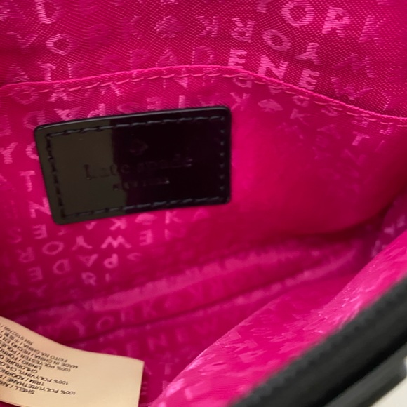 NWT Kate Spade black striped pouch